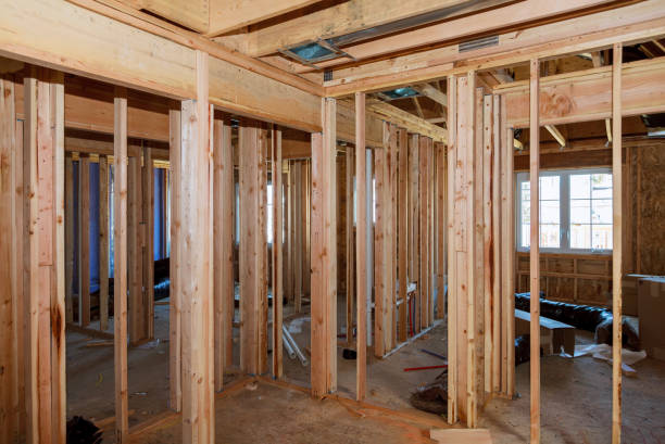istock Construction home framing on residential beam framework wooden new house 1251021916