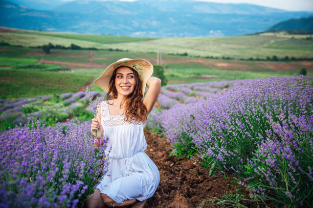 istock Woman enjoying in lavender field 1251022627