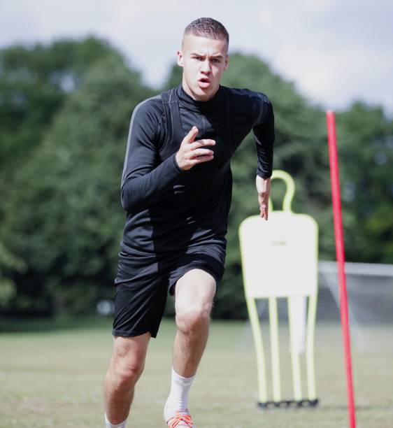 A young man football training.