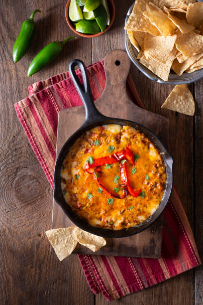 Melted Cheese Queso Fundido with Chorizo in a Cast Iron Skillet cheese dip stock pictures, royalty-free photos & images