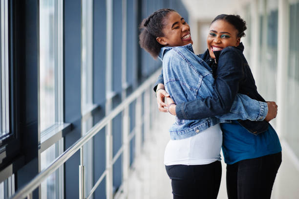 istock Two african woman friends 1251027306