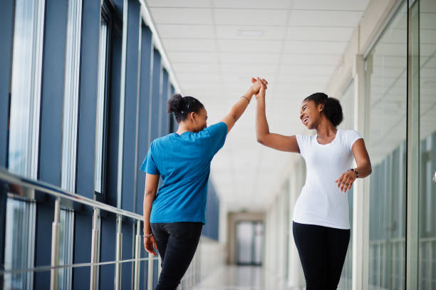 istock Two african woman friends 1251027461