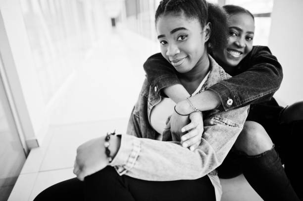 istock Two african woman friends 1251027500