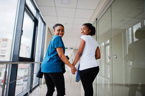 istock Two african woman friends 1251027504