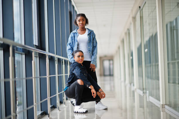 istock Two african woman friends 1251028187