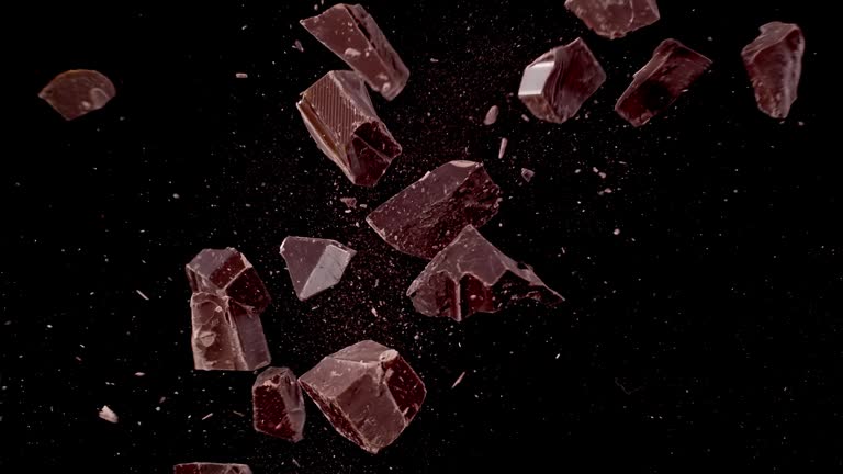 Dark Chocolate Chunks Colliding in the Air Super Slow Motion Video 1000 fps