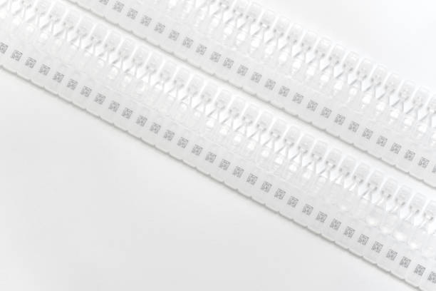 istock BFS Blow Fill Seal ampules pack with barcode inspection 1251031965