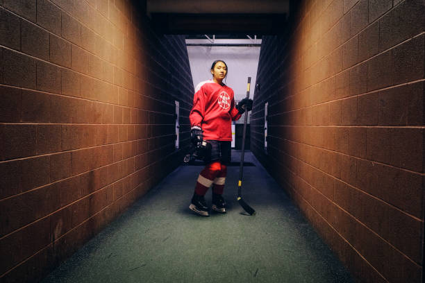 istock Woman Hockey Player 1251042885