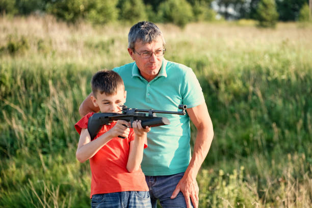 istock Father and Son Rifle Lessons 1251043498