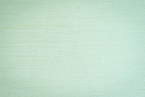 istock Silk fabric wallpaper texture pattern background in light pale blue green teal color 1251043636