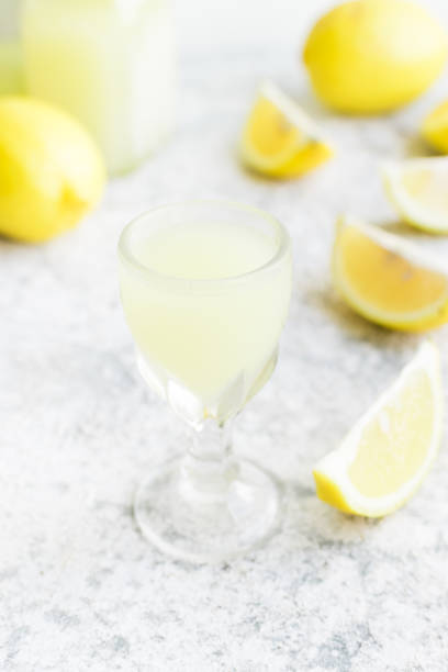 istock Italian traditional liqueur limoncello with lemon 1251044209