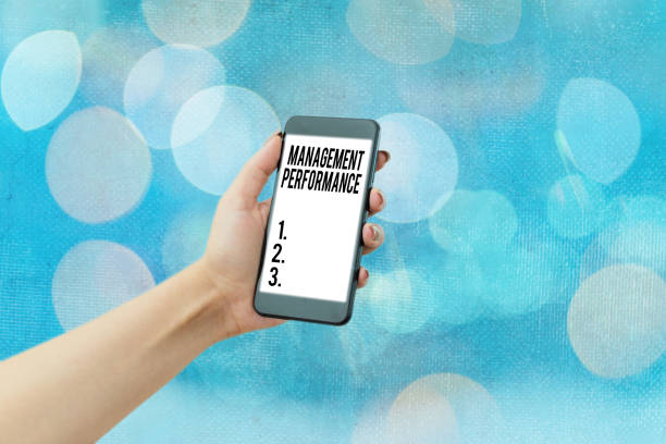 istock Handwriting text Management Performance. Concept meaning feedback on Managerial Skills and Competencies. 1251044333
