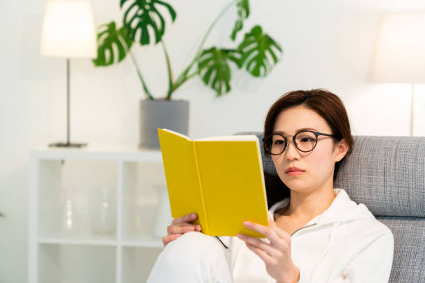 istock asian woman who reads a book 1251048577