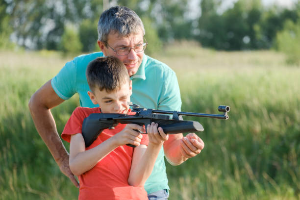 istock Father and Son Rifle Lessons 1251052046