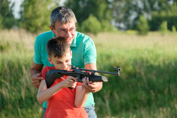 istock Father and Son Rifle Lessons 1251054820
