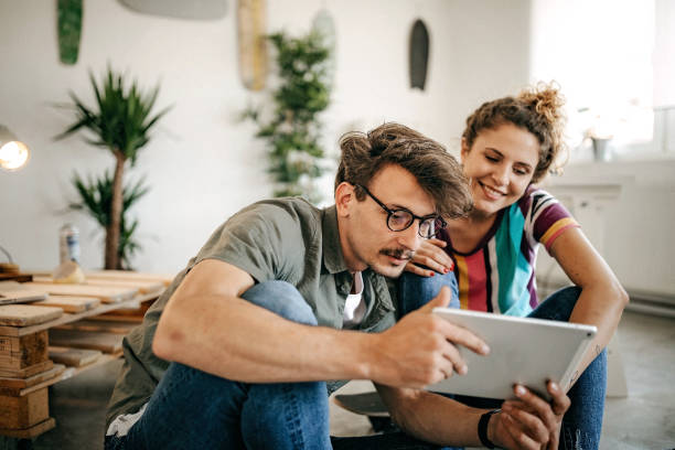 istock Couple planing how to spend time at home 1251057711
