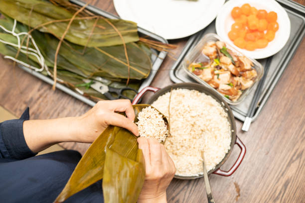 istock Making Chinese dumplings - Zongzi 1251058286