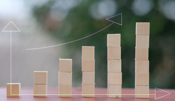 istock Businessman plan a project with wood cubes 1251060267
