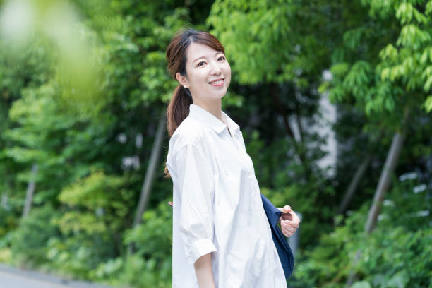 istock Asian woman taking a walk 1251073800