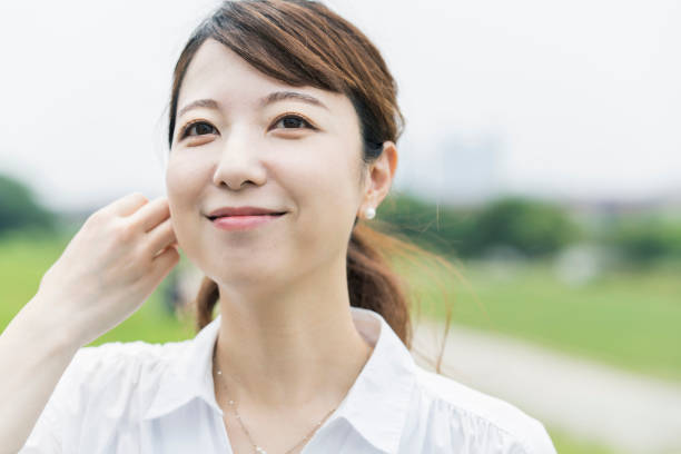 istock Asian woman taking a walk 1251073834