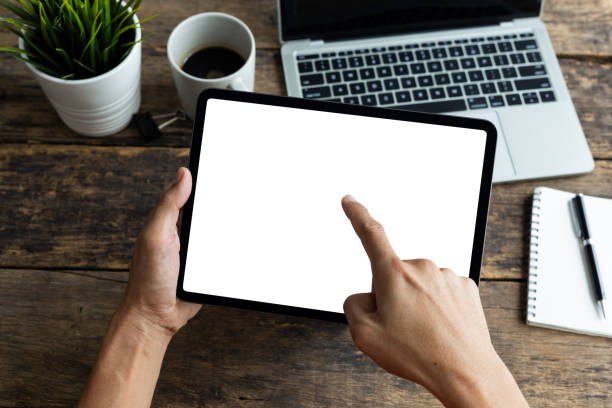 istock Mockup image tablet, man hand holding tablet pc with blank white screen 1251075426