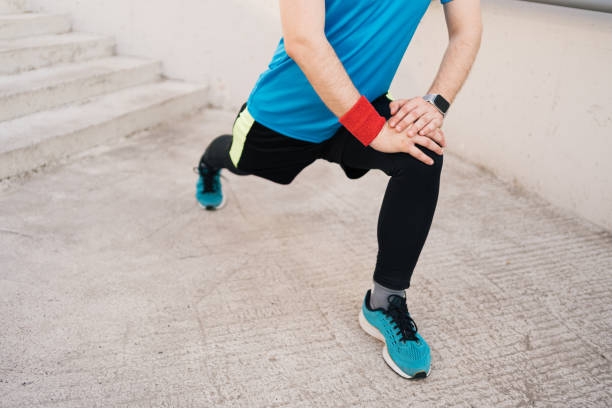 istock Caucasian man stretching city workout 1251076655