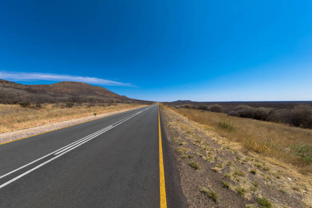 Scenery route through Death Valley National Park, lonesome road in the desert, California USA