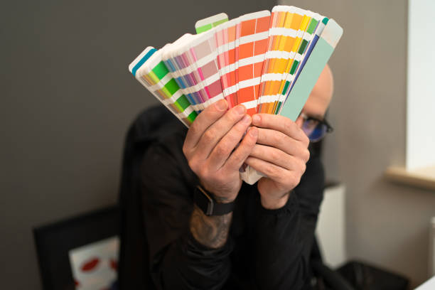 istock A man working with a color pallet in the office 1251083810