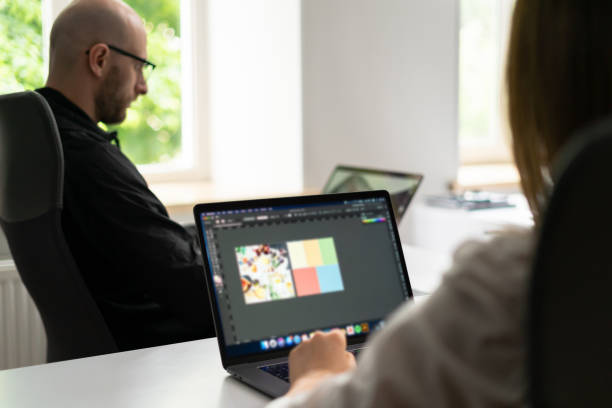 istock Two colleagues discussing new information about products 1251083839