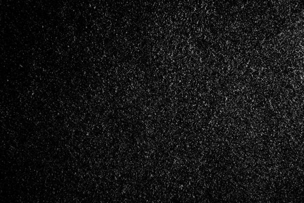 istock abstract real dust floating over black background for 1251084988