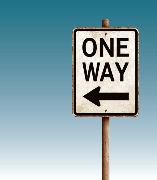 istock Grunge one way road sign vector illustration and blue sky 1251087398