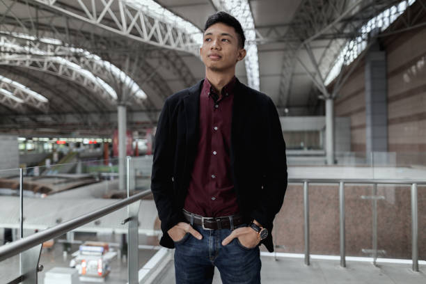 istock Asian casual businessman on the go 1251087576