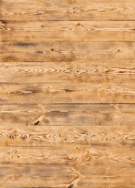 istock pine wooden panelling with knots 1251090158