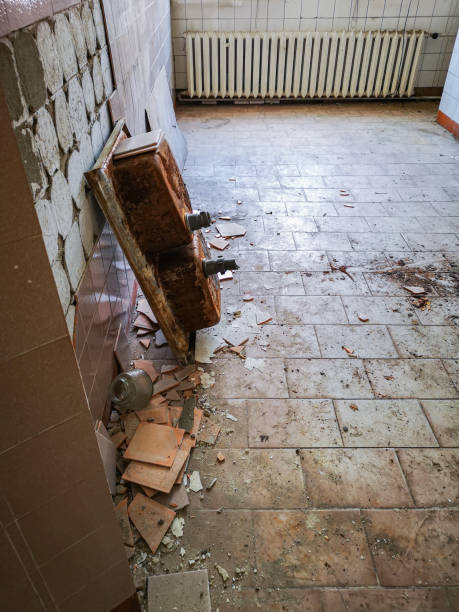 istock Old rusty double washbasin in old abandoned hospital 1251095252