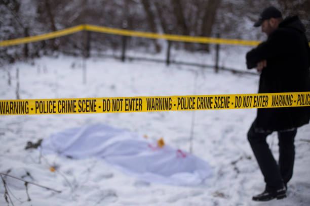 istock Crime scene, snow, detective 1251095606