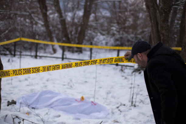 istock Crime scene, snow, detective 1251095628