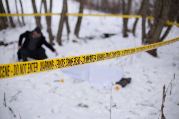 istock Crime scene, snow, detective 1251095713