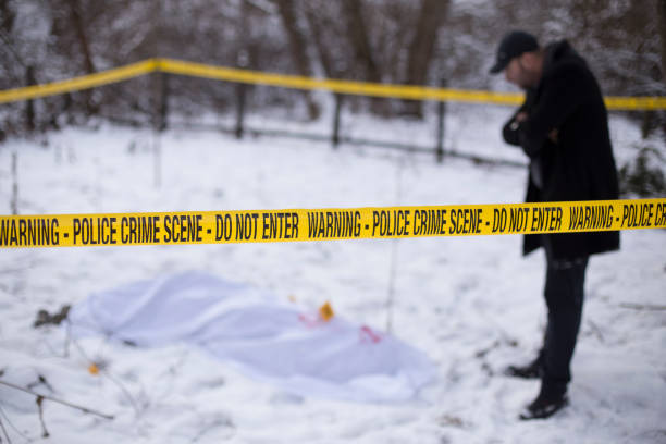 istock Crime scene, snow, detective 1251095714