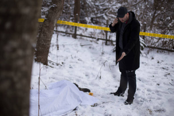 istock Crime scene, snow, detective 1251095720