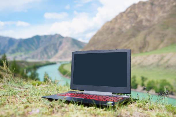 istock laptop outdoors 1251095725