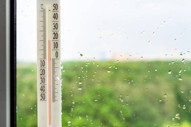 istock outdoor thermometer on home window after rain 1251095799