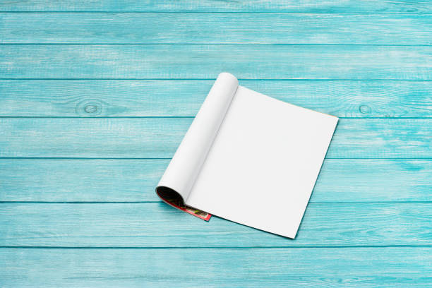 istock Mock-up magazine, newspaper or catalog on blue background. Blank page 1251102844