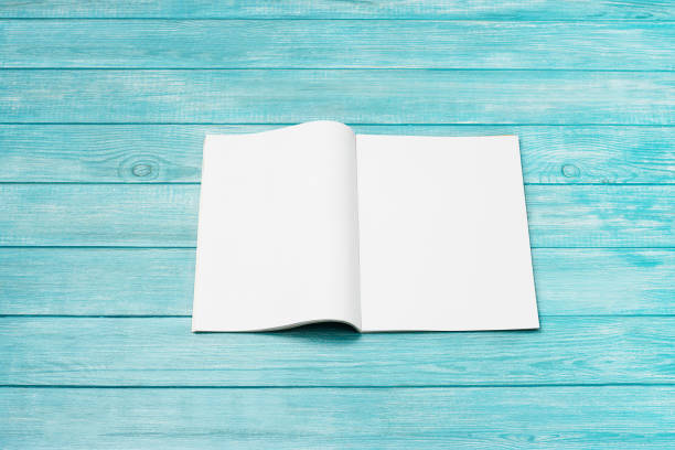 istock Mock-up magazine, newspaper or catalog on blue background. Blank page 1251102855