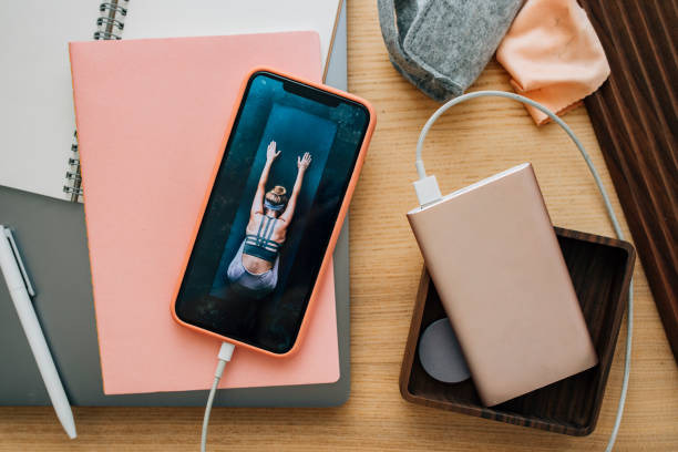 Mobile Phone Charging through a Portable Battery, a Close Up