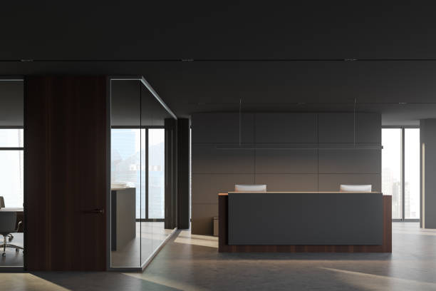 istock Grey and wooden reception in corporate office 1251111619