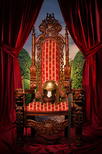 Historical helmet on the throne in studio shoot