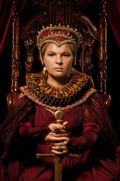 Photo of Historical blonde saintly Queen character on the throne