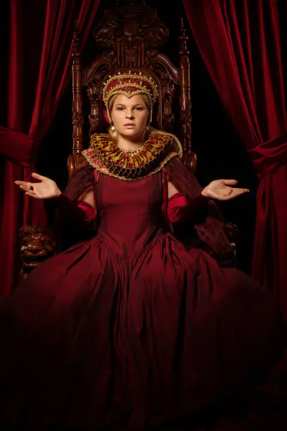 Photo of Historical blonde saintly Queen character on the throne