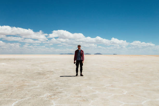 istock Alone man at Salar de Uyuni, Bolivia 1251118528