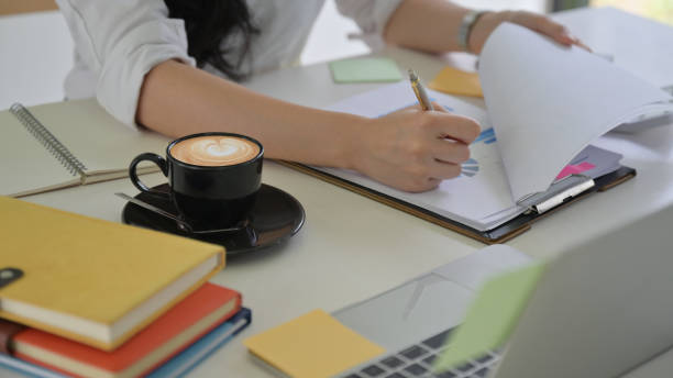 istock Management is checking information including coffee in the office. 1251120053